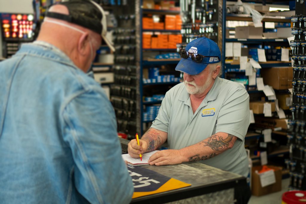 Man Discussing Employment with NAPA Employee